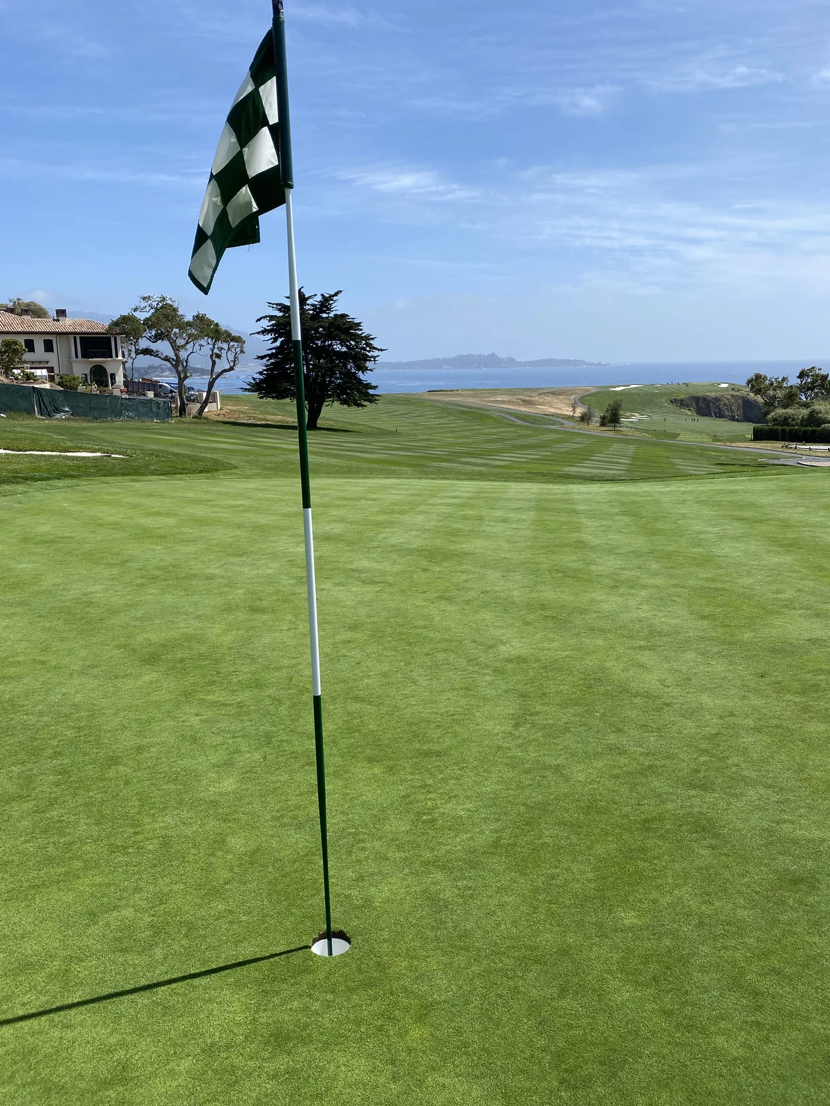 Pebble Beach Golf Links - flag on the green with ocean view