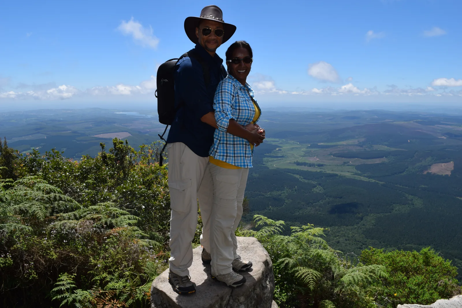 Loren and his wife on a rock above the escarpment