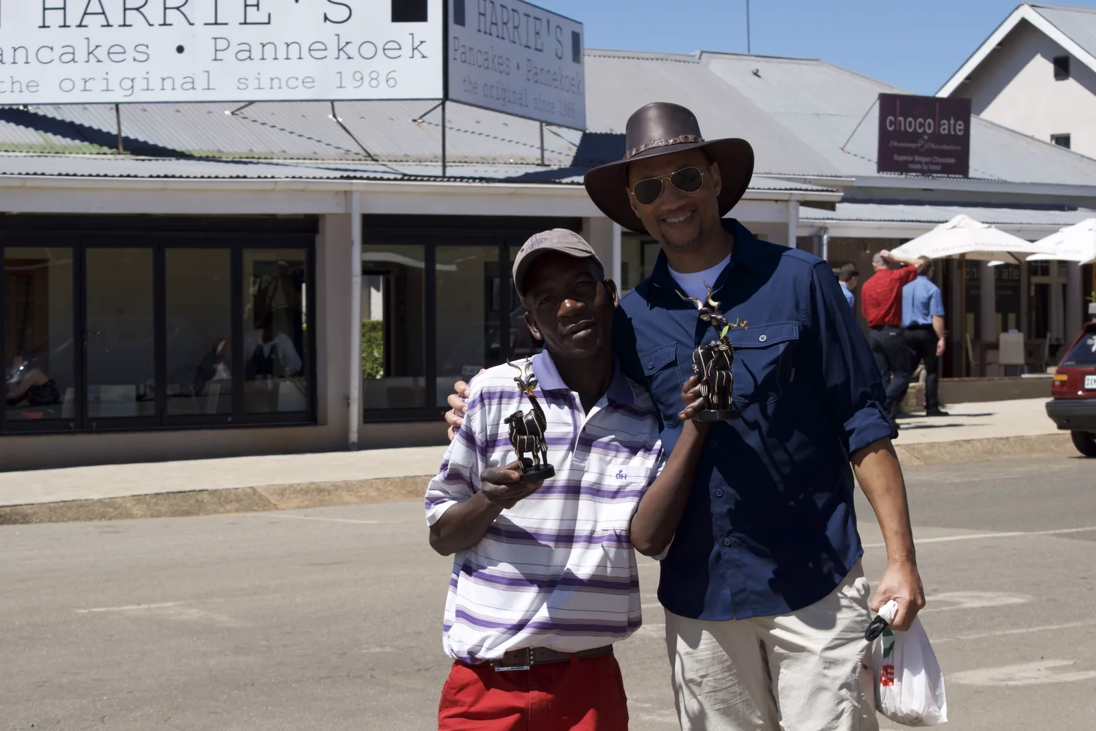Loren with a local friend outside Harrie's Pancakes