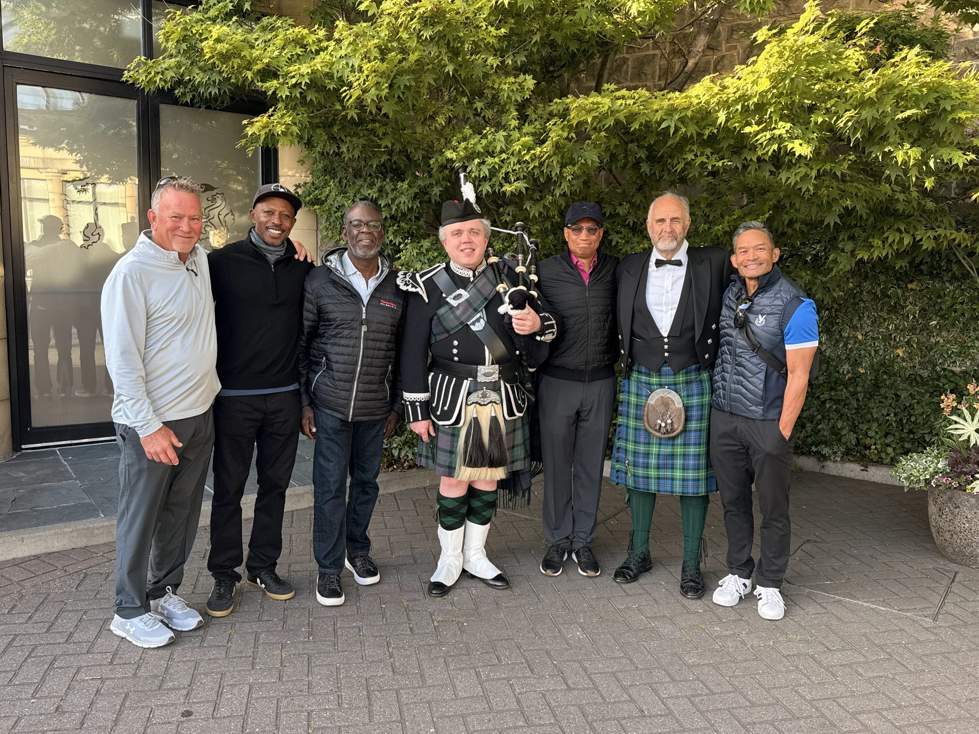 The group in Highland dress at the farewell dinner